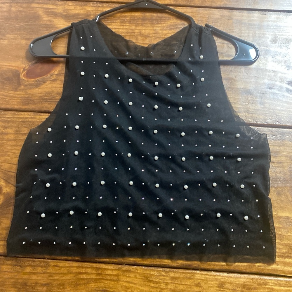 Elegant Black Sleeveless Top with White Dots